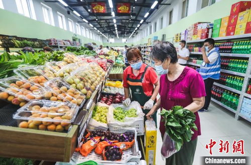 北京新发地正式复市 上千辆车载上万吨蔬果 重装上阵